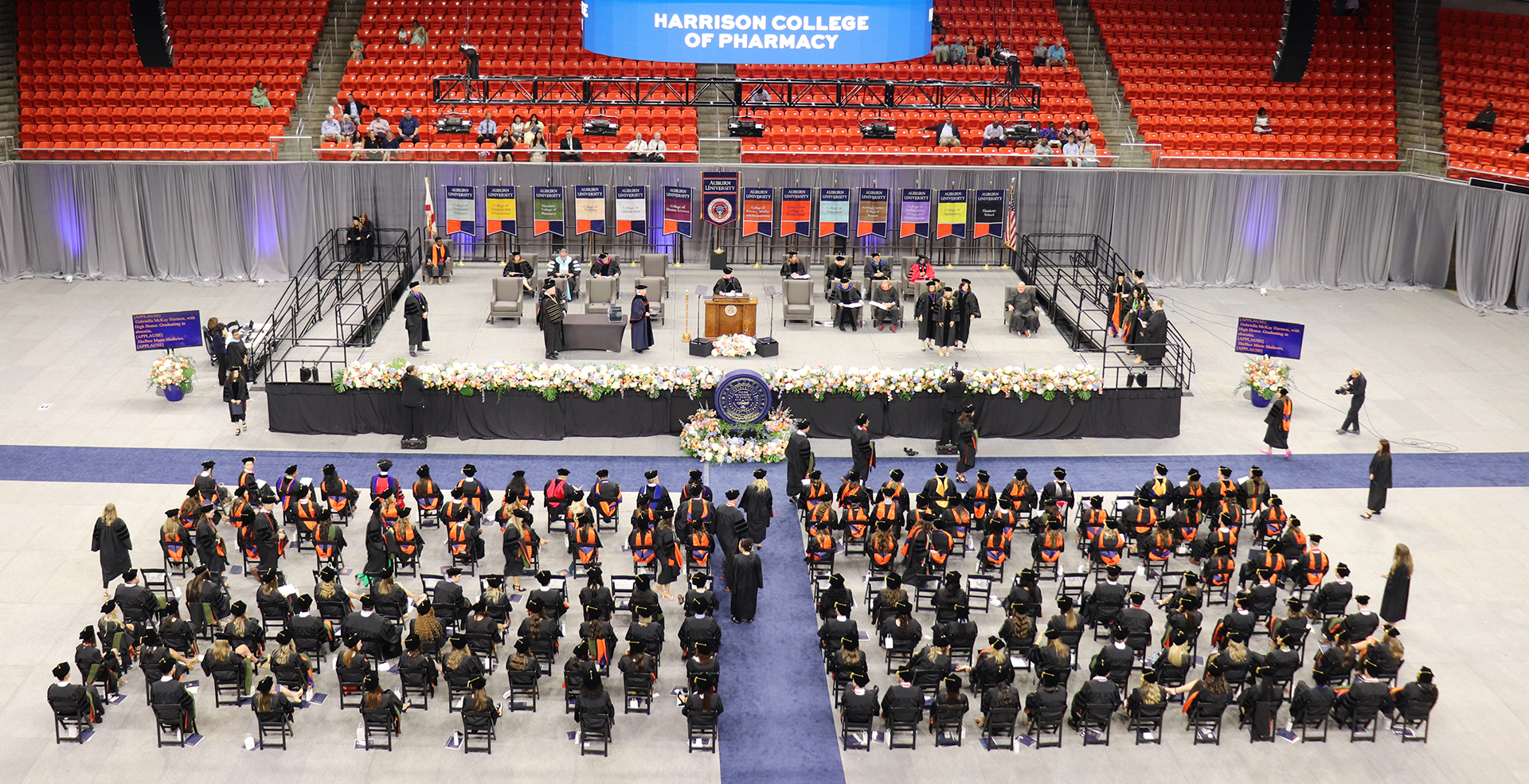 Overhead view of students approaching and crossing stage