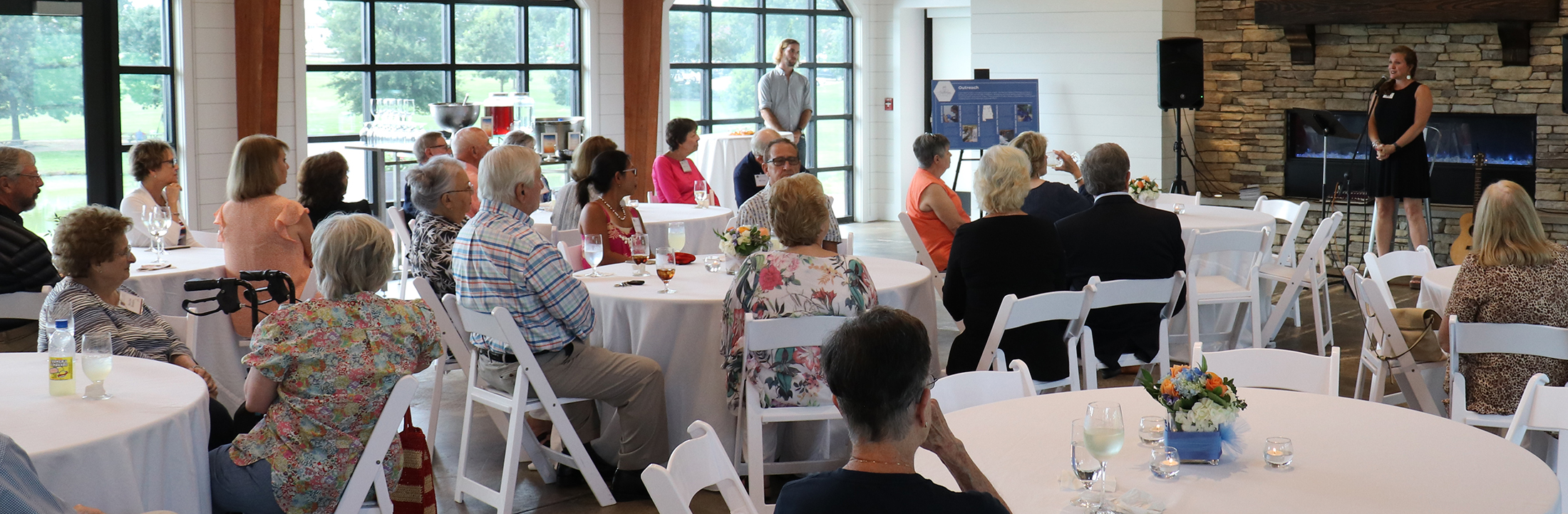 Dean speaks to a group