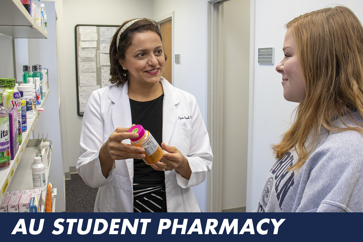 Pharmacist talks with student