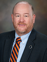 Headshot of Robert D. "Rusty" Arnold