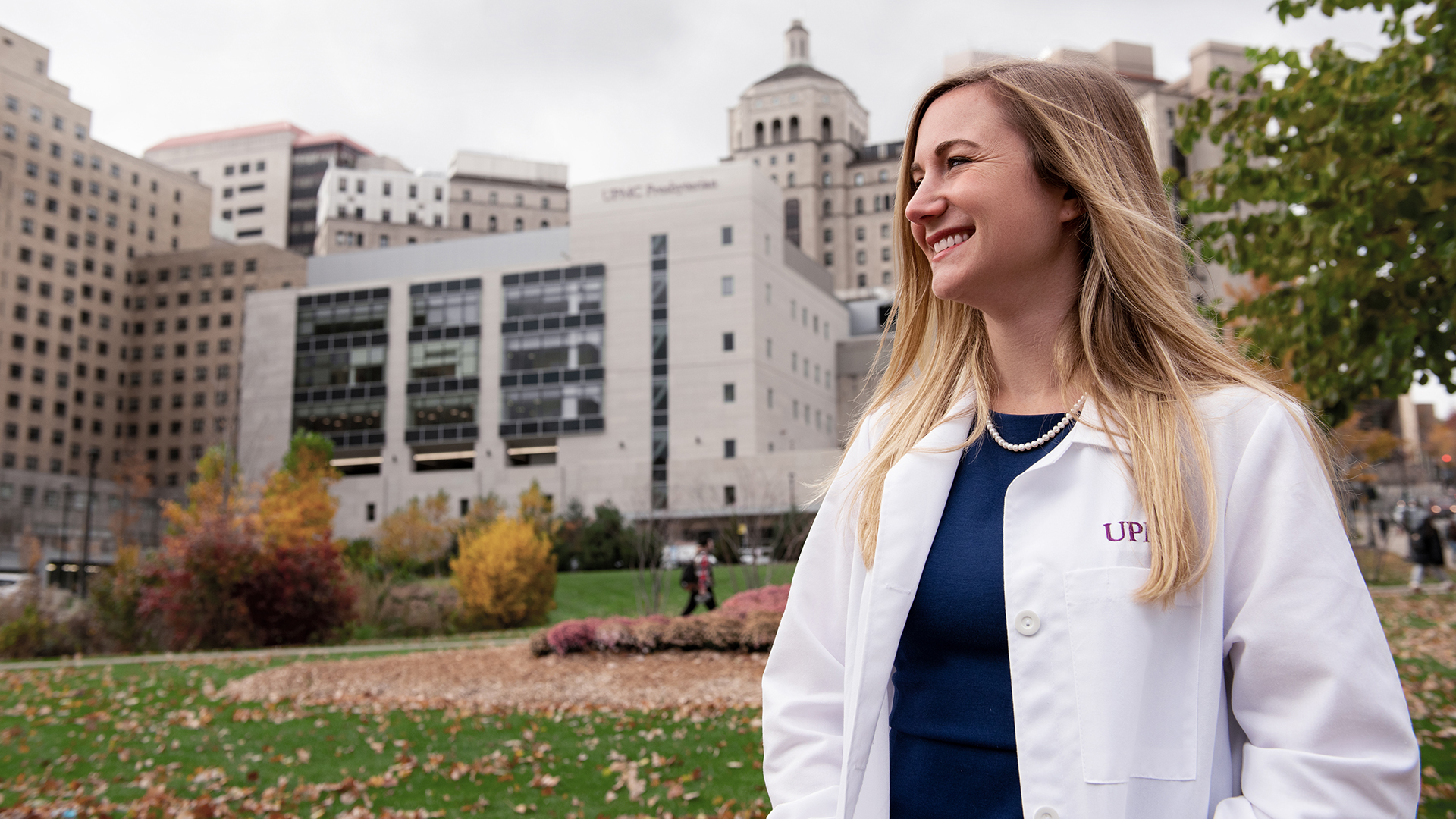 Dr. Erin McCreary in front of hospital