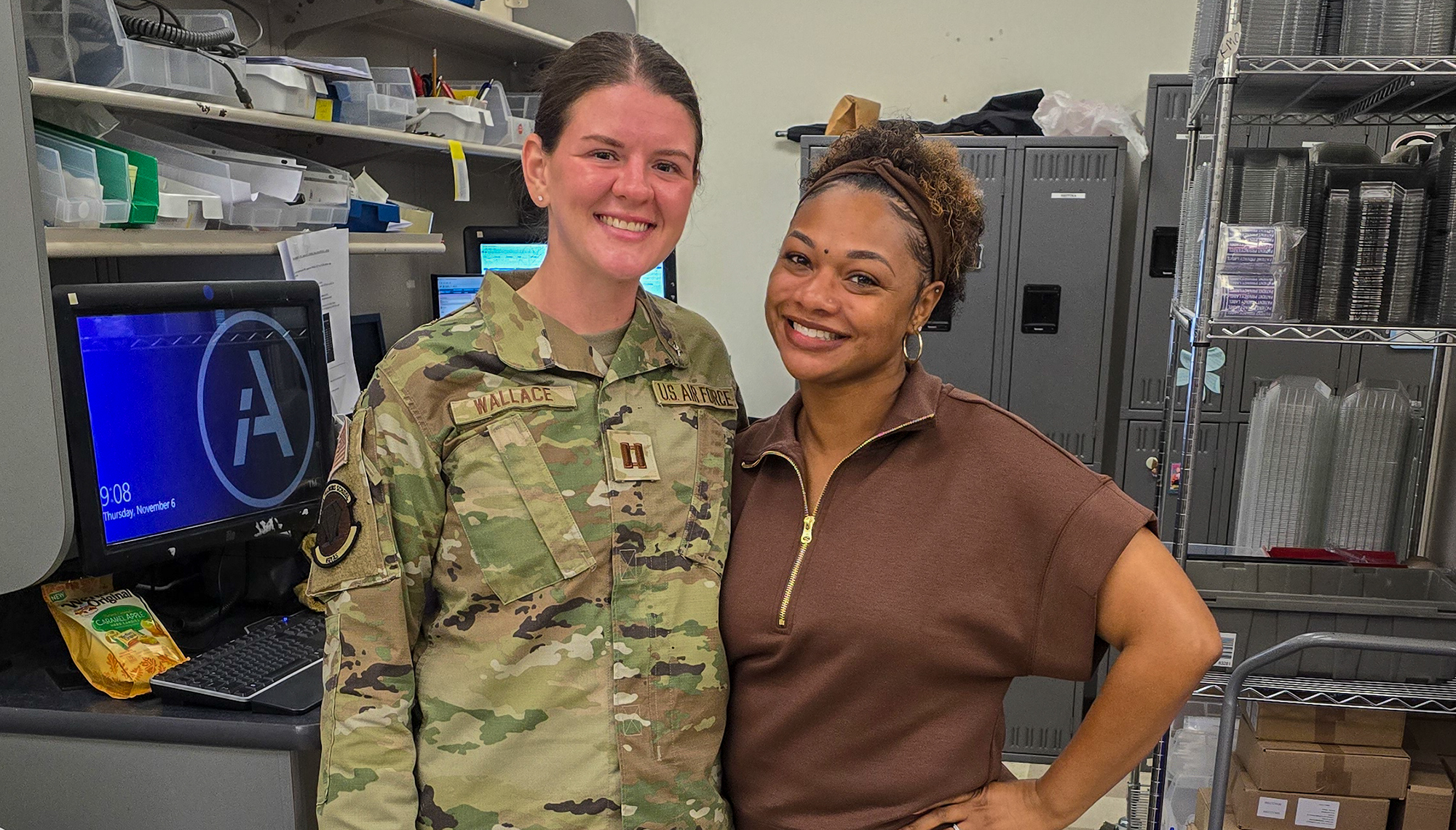 Two people stand together