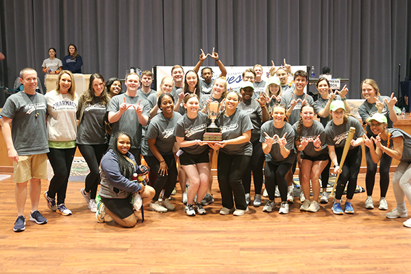 Team of students hold trophy